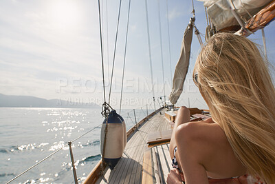 Buy stock photo Relax, travel and back of woman on yacht for summer vacation, seaside journey and peace. Holiday getaway, tropical adventure and sailing with person on boat for cruise, tourism and transport