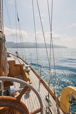 Buy stock photo Travel, sailing and steering wheel of yacht at sea, luxury tourism and marine adventure for holiday. Cruise service, ocean and boat with offshore navigation for voyage, transport or tropical vacation