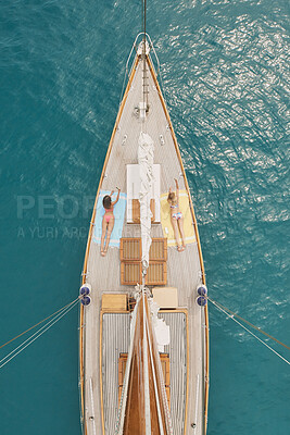 Buy stock photo Selfie, travel and relax with friends on yacht for summer vacation, suntanning and sea adventure. Picture, sailing and tropical cruise with above of women on boat for ocean and social media