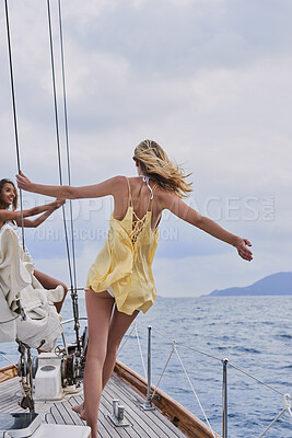 Buy stock photo Travel, freedom and ocean with friends on yacht for summer vacation, seaside getaway and peace. Holiday cruise, bonding and sailing with women on boat for tropical journey, tourism and relax together