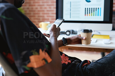 Buy stock photo Coffee, hands and phone with designer at desk in office for communication, report or research. App, takeaway drink and typing with man in design workplace for chatting, feedback or mobile update