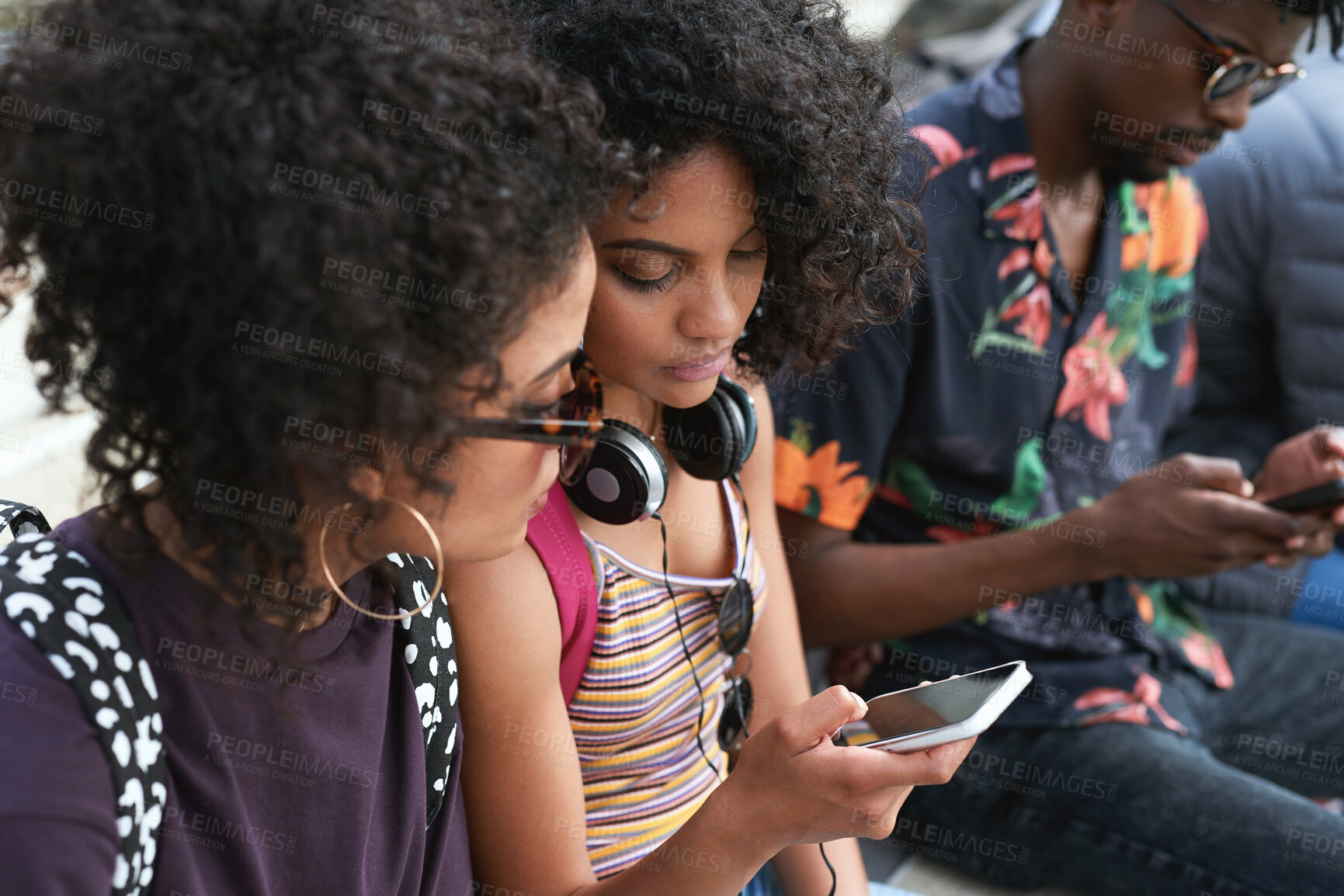 Buy stock photo Phone, friends and people outdoor for social connection, online fashion and show music playlist. Gen z students, mobile and women hangout with audio app, streetwear and share podcast info on internet