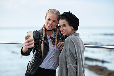 Buy stock photo Selfie, happy or friends at beach with fun, hangout picture or bonding post on weekend break. Smile, space or women at ocean with connection, outdoor trip or memory capture for social media update.