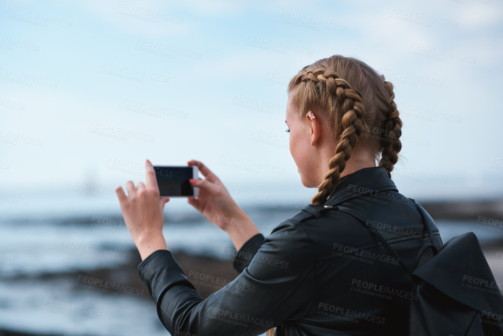 Buy stock photo Outdoor, tourist or woman with phone for photography, travel blog or social media post for trip update. Mobile, influencer or person with beach picture for destination vlog, vacation memory or back