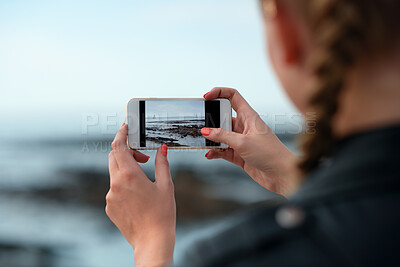 Buy stock photo Outdoor, tourist and hands with phone screen for photography, travel blog and holiday trip. Mobile, influencer or person with beach picture for destination vlog, vacation memory or social media post