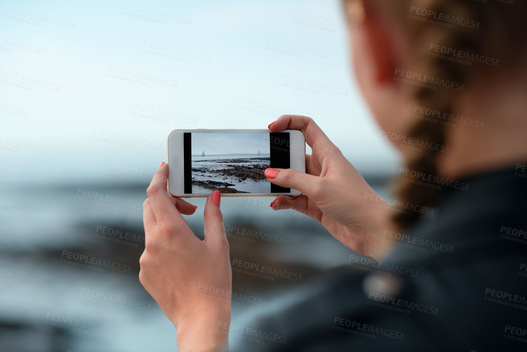 Buy stock photo Outdoor, tourist and hands with phone screen for photography, travel blog and holiday trip. Mobile, influencer or person with beach picture for destination vlog, vacation memory or social media post
