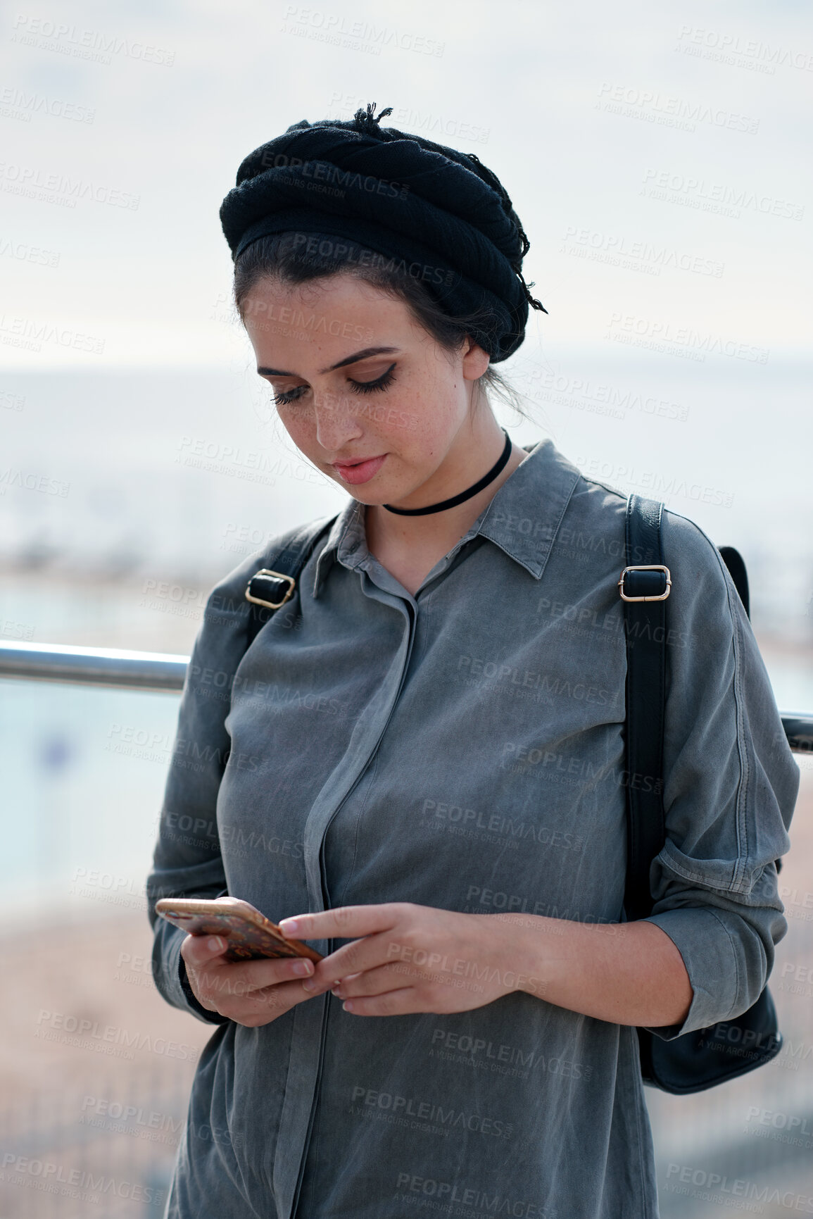 Buy stock photo Phone, travel and woman by beach on holiday for texting, social media or contact on mobile app. Technology, promenade and female person on cellphone for blog on vacation tips by ocean on weekend trip