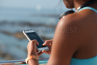 Buy stock photo Cellphone, hands and woman by beach on holiday for texting, social media or contact on mobile app. Technology, promenade and female person on phone for blog on vacation tips by ocean on weekend trip.