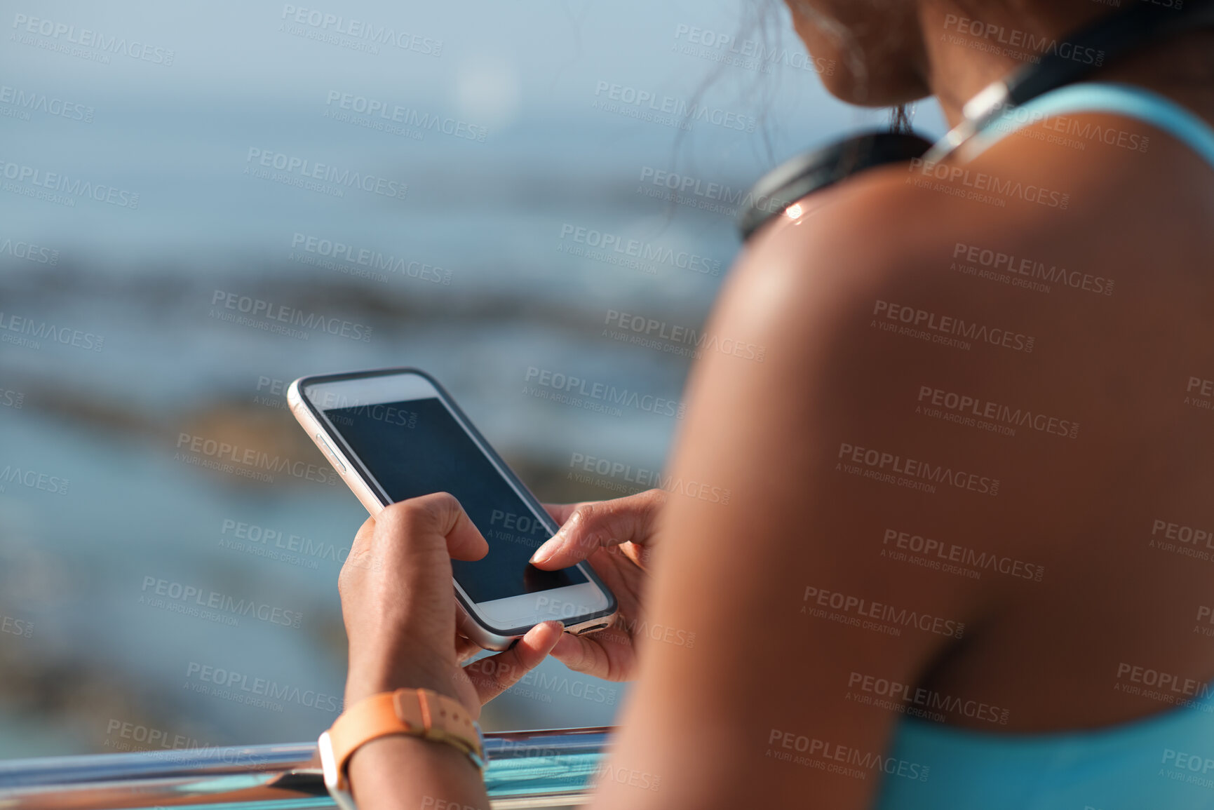 Buy stock photo Cellphone, hands and woman by beach on holiday for texting, social media or contact on mobile app. Technology, promenade and female person on phone for blog on vacation tips by ocean on weekend trip.