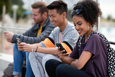 Buy stock photo Phone, friends and woman outdoor for social connection, networking online and text message. Happy people, mobile and students with app, media or reading notification for internet comment on forum