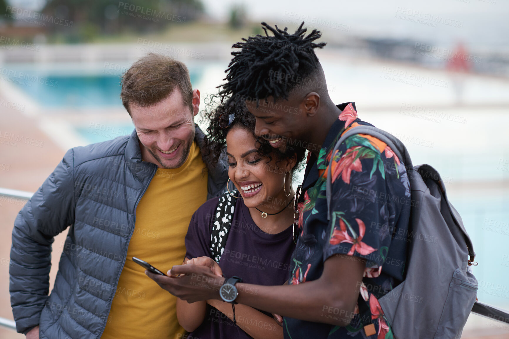 Buy stock photo Phone, friends and laugh outdoor with social media, funny joke and sharing text message with lecturer. Happy people, mobile and students with meme, post or show comment for  by pool with tutor