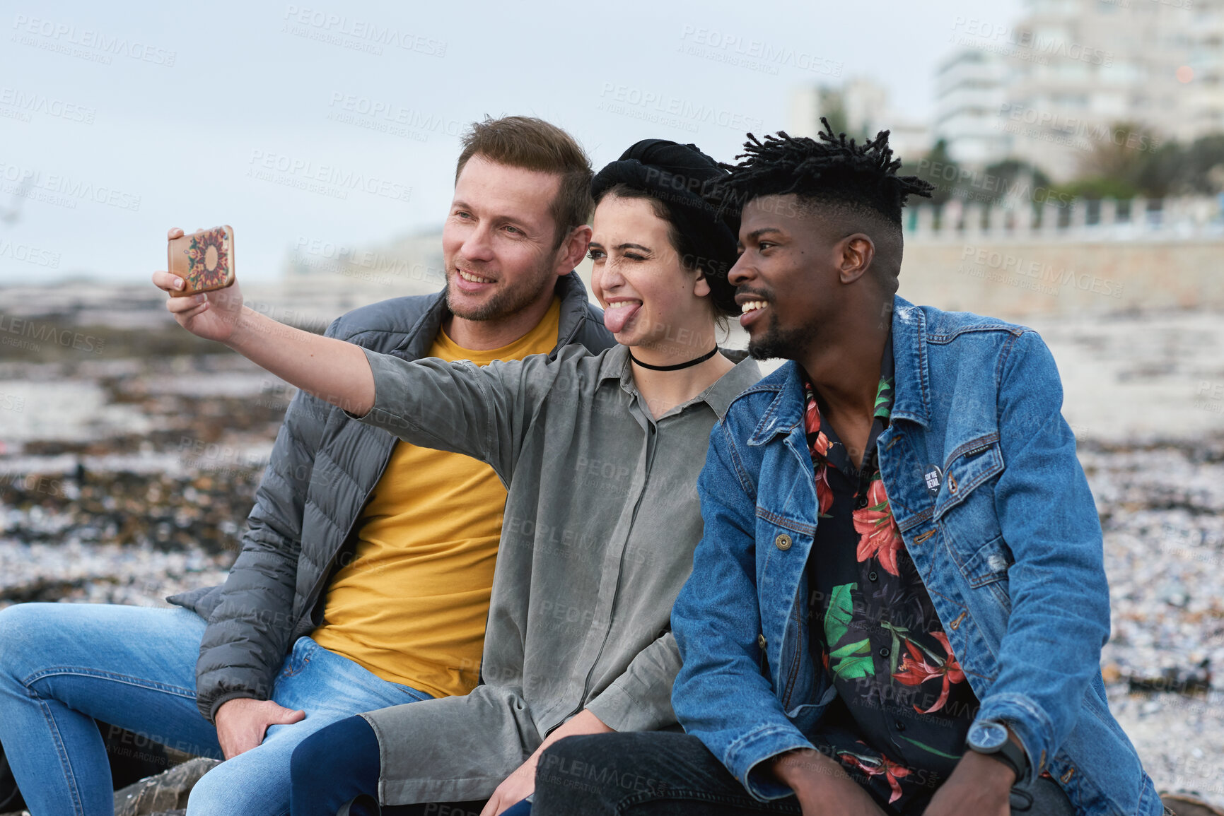 Buy stock photo Selfie, hangout or friends outdoor with tongue out, group picture or bonding post on weekend break. Smile, digital photography or people with fun, trip connection or memory capture for social media.