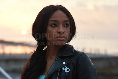 Buy stock photo Travel, thinking and black woman outdoor at sunset for sightseeing, view and wanderlust on holiday. Vacation, thoughts and serious person with reflection, tourism and contemplating on adventure