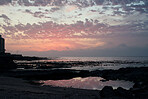 View of sea at sunset beautiful beach seaside peaceful reflection of sky in water