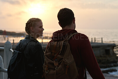 Buy stock photo Outdoor, sunset and couple with smile for travel, weekend bonding and holiday trip for connection. Evening, view beach and happy people with vacation for abroad adventure, tourism and sightseeing