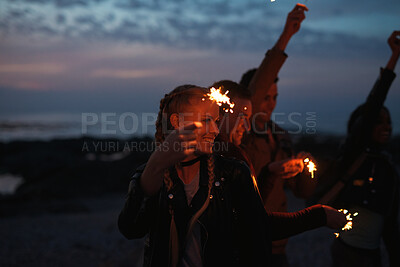 Buy stock photo Party, dance and people with sparkler outdoor for celebration, social gathering and bonding together. Friends, fireworks and moving to music in nature for new year, festive season or excited at night