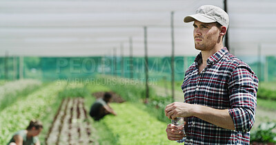 Buy stock photo Farmer, thinking and water bottle in greenhouse with agribusiness, food production and sustainability. Person, work break and reflection on farm with hydration, planning and vision for agriculture.