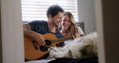 Buy stock photo Guitar, husky and laughing with couple in home together for bonding, connection or security. Dog, music and pet owner people playing instrument in apartment for break, funny or humor on weekend