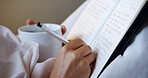Hands, writing and person in home with diary, storytelling and self reflection for stress relief. Coffee, notebook and journaling at house with notes, personal growth and thoughts for future planning