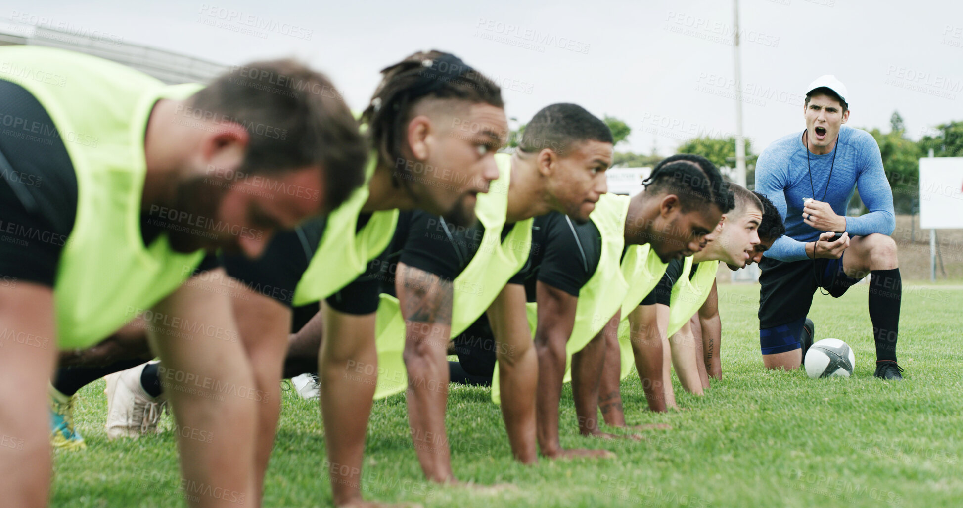 Buy stock photo Rugby, team and push up on field with coach, shout instructions and workout for tournament practice. Sports, manager scream and people outdoor on grass with training, exercise and fitness challenge.
