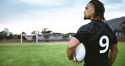 Buy stock photo Man, thinking and rugby player on field with ball, game plan and contemplation for fitness practice. Athlete, person and outdoor with equipment for match, vision and brainstorming for sport tactics.