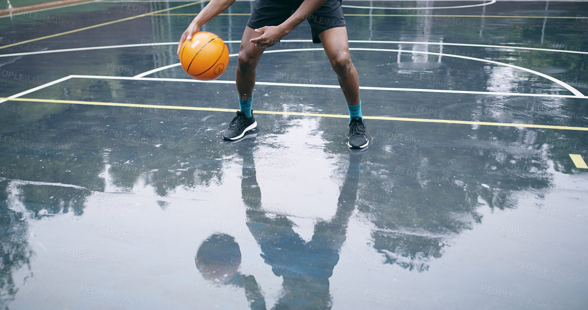 Buy stock photo Man, basketball and legs on court for training, workout and exercise for tournament. Player, reflection and healthy person with practice for fitness, skills development for dribble and competition
