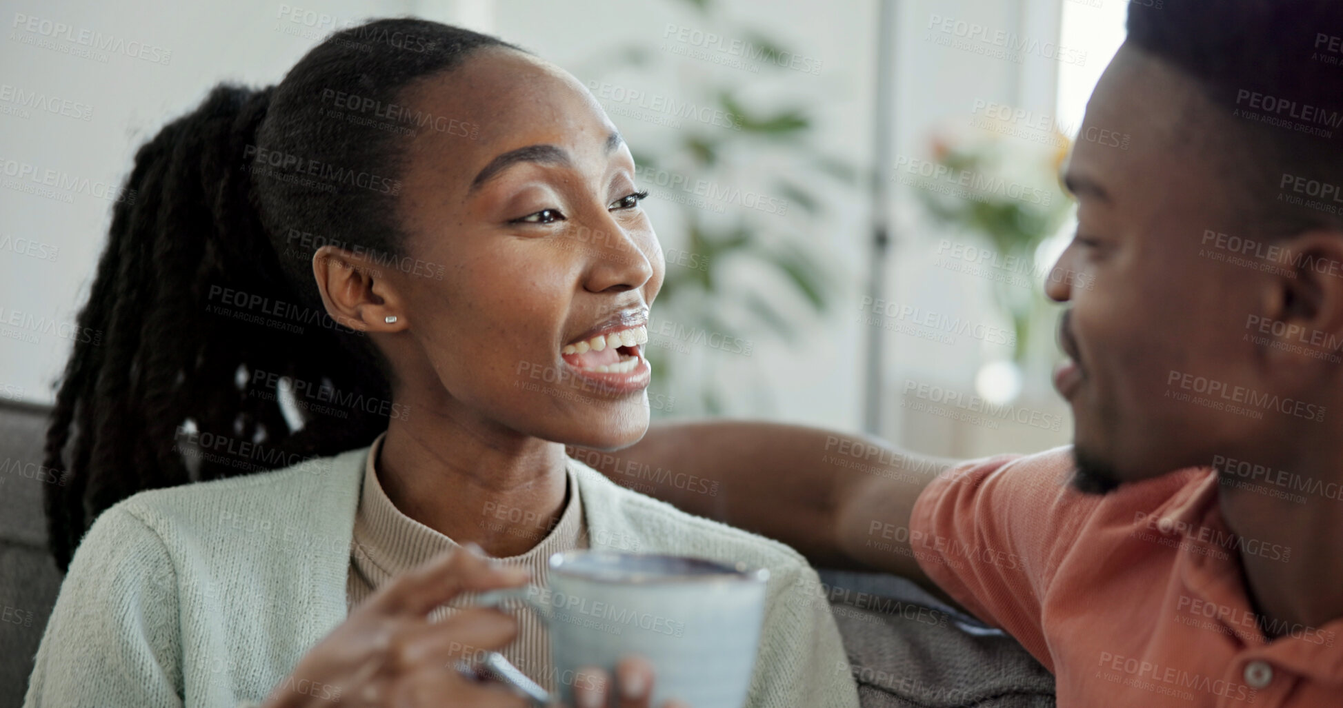 Buy stock photo Happy, couple and conversation in home with coffee, connection and love bonding together in morning. Black people, dating and discussion in living room with tea, gossip and relationship commitment.