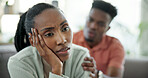 Disappointed, woman and couple in home with conflict, relationship problem and contemplating breakup. Sad, girlfriend and black people dating with argument, disagreement and cheating affair in house.