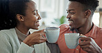 Happy, couple and black people in home with coffee, connection or love bonding together in morning. Wellness, woman and man dating with smile for caring relationship, commitment or beverage in lounge