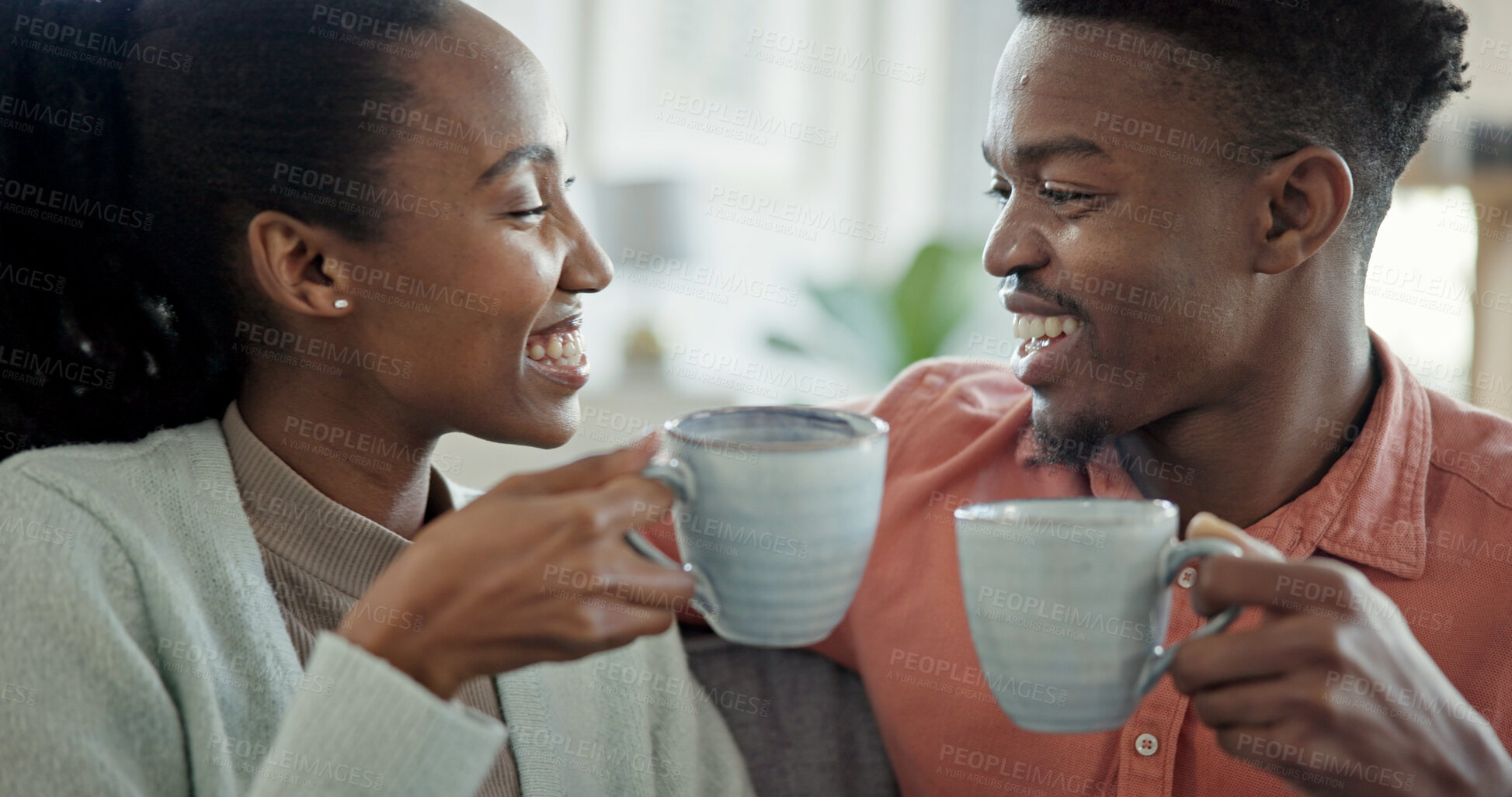 Buy stock photo Happy, couple and black people in home with coffee, connection or love bonding together in morning. Wellness, woman and man dating with smile for caring relationship, commitment or beverage in lounge