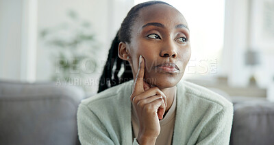 Buy stock photo Thinking, waiting and black woman on sofa in home with memory, reflection or nostalgia in living room. Decision, planning and African female person with guess, solution or bored in apartment.