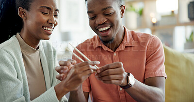 Buy stock photo Happy, couple and learning at house with chopsticks, technique and assistance for new skill. Black people, laugh and help with sticks for dining etiquette, Japanese customs and bonding for tradition