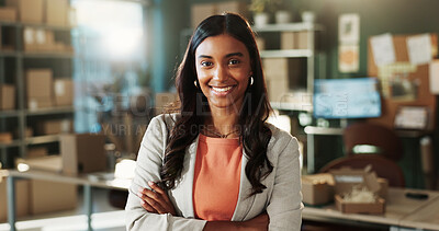 Buy stock photo Logistics, portrait or Indian woman in office with arms crossed, career pride or about us in supply chain. Distribution, smile or supplier with stock, confidence or ambition in courier service.