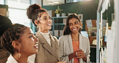 Buy stock photo Glass wall, planning and smile with women in logistics warehouse for strategy satisfaction. Ecommerce, storyboard and supply chain with happy team in office for delivery, distribution or shipping