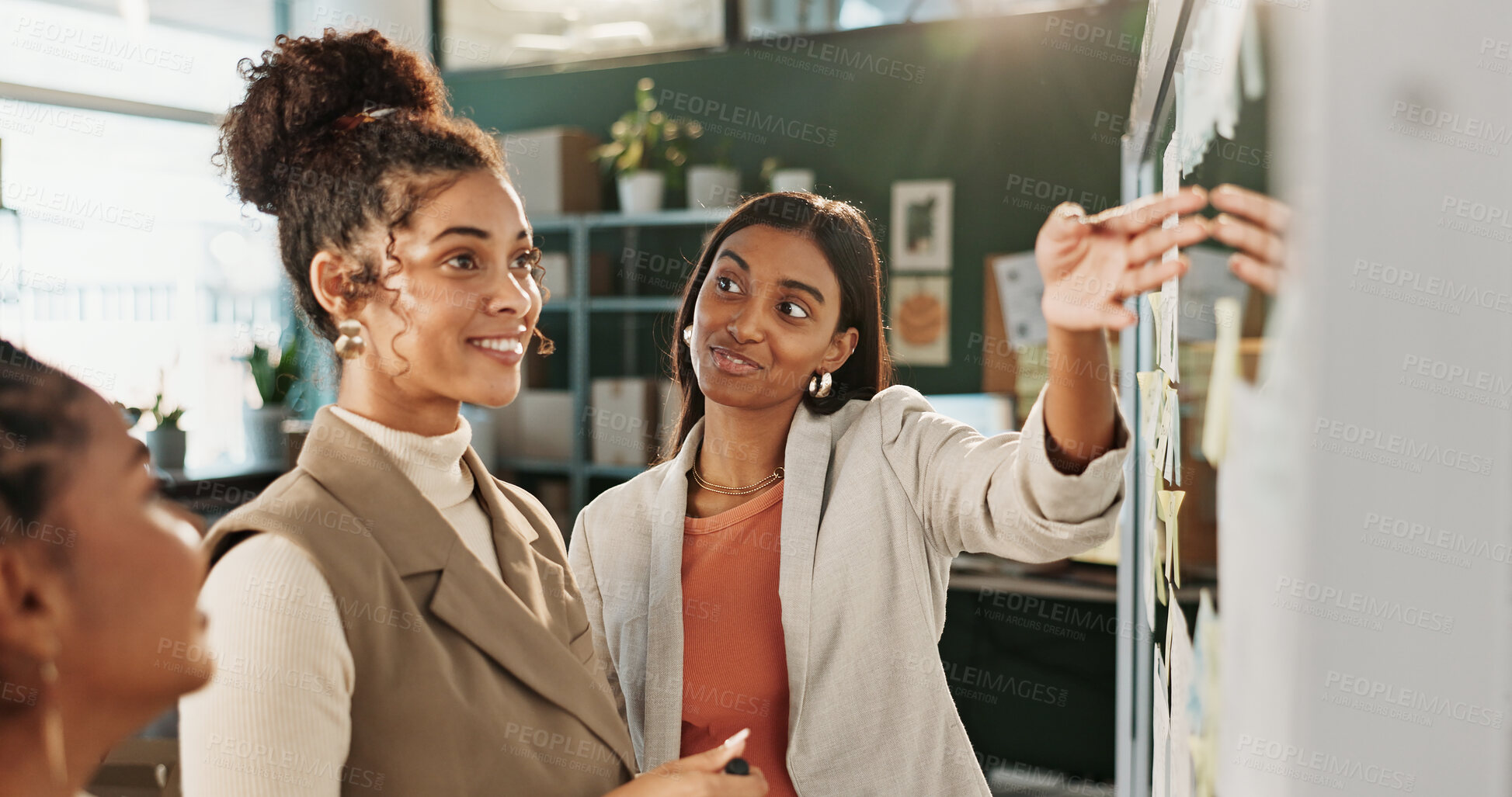 Buy stock photo Glass wall, planning and talking with women in logistics warehouse for feedback or review. Ecommerce, pointing and storyboard with happy employees in office for delivery or distribution update
