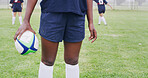 Rugby, ball and hands of woman on field for competition practice, sports tournament and fitness. Training, wellness and game challenge with legs of person outdoor for club, athlete and commitment