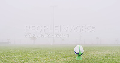 Buy stock photo Rugby, mist and fitness with ball on field for competition practice, kick off and sports tournament. Game event, match pitch and fog with equipment in stadium outdoor for mockup, hobby and score
