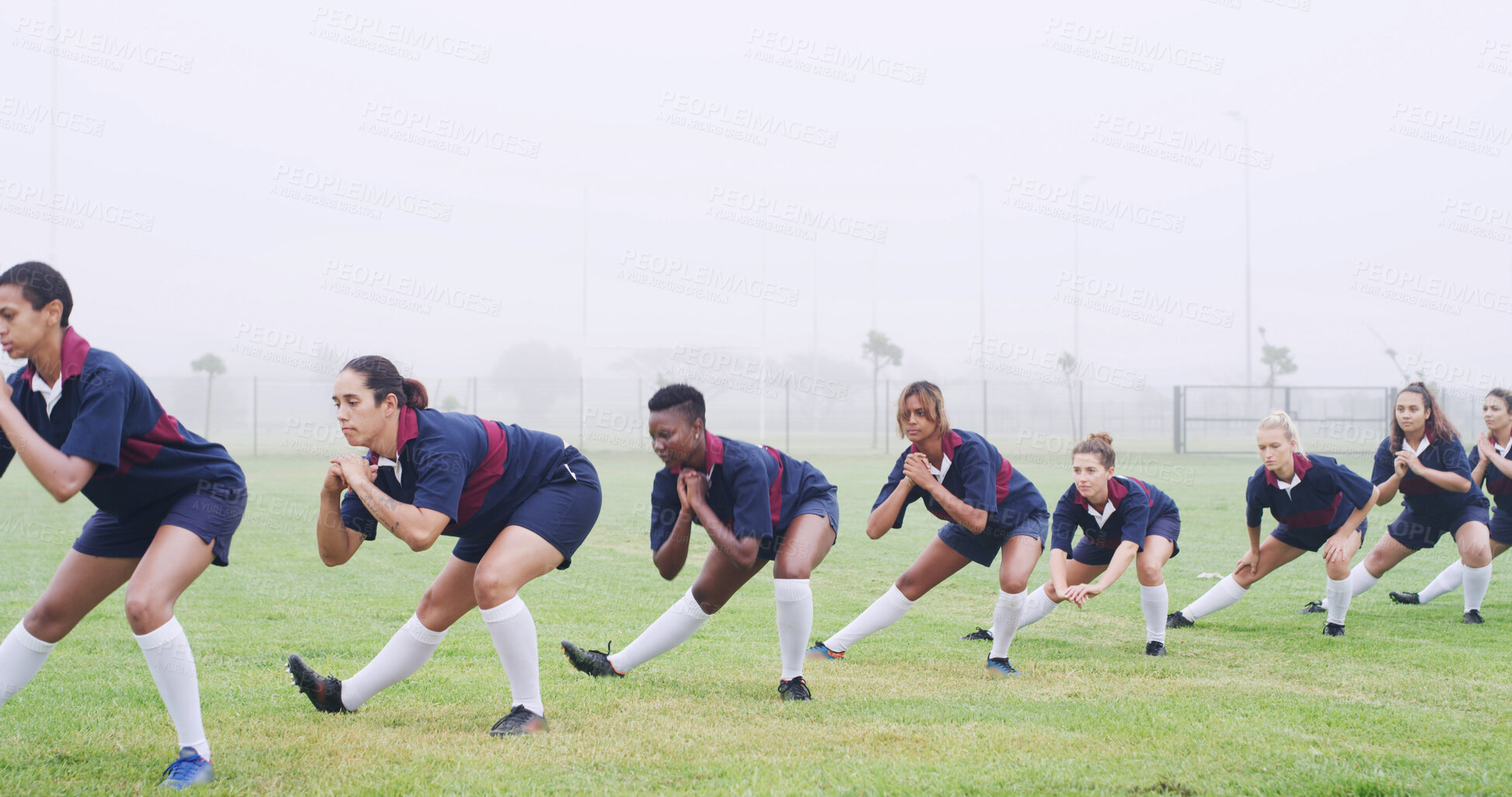 Buy stock photo Teamwork, rugby and squat with women on field for competition practice, training start and stretching. Exercise preparation, warm up and sports club with people outdoor for muscle and match health