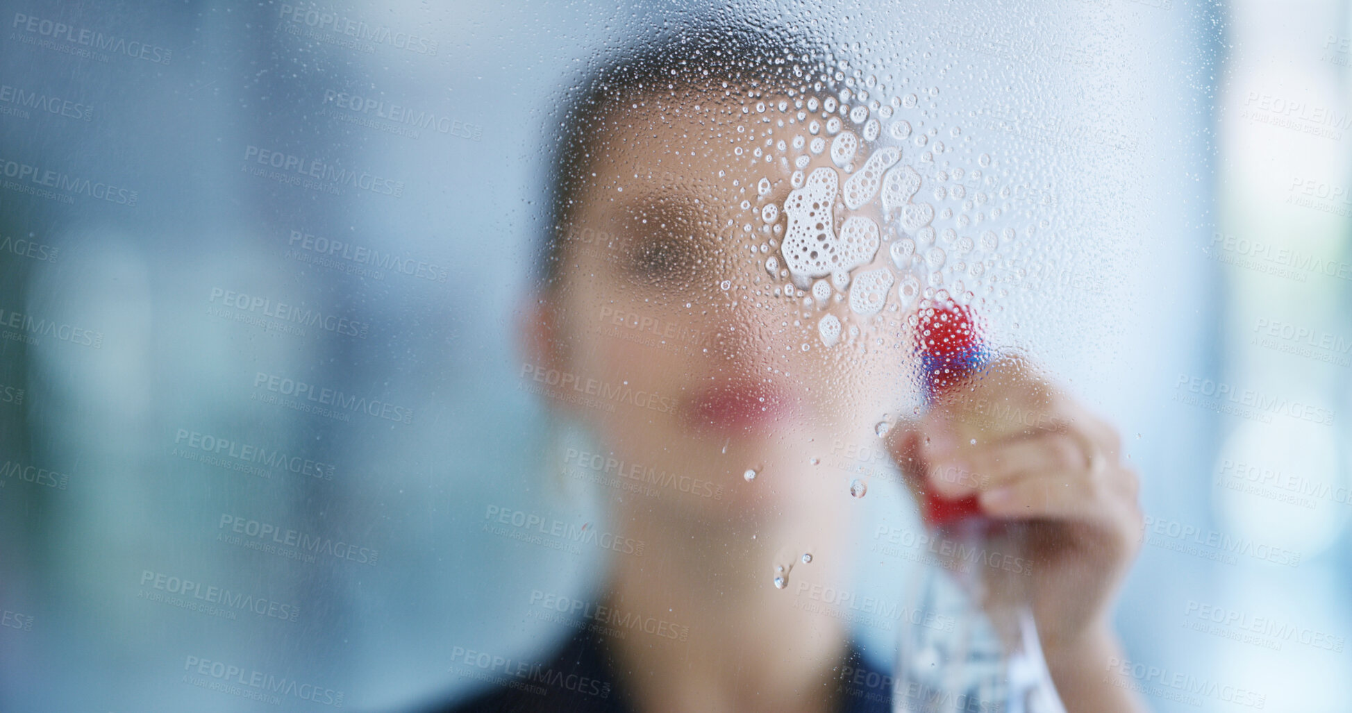 Buy stock photo Woman, hands and cleaning window with spray in office for hygiene, disinfection or maintenance. Blur, female person or cleaner with detergent, soap or liquid mist for dirt, bacteria or germ removal
