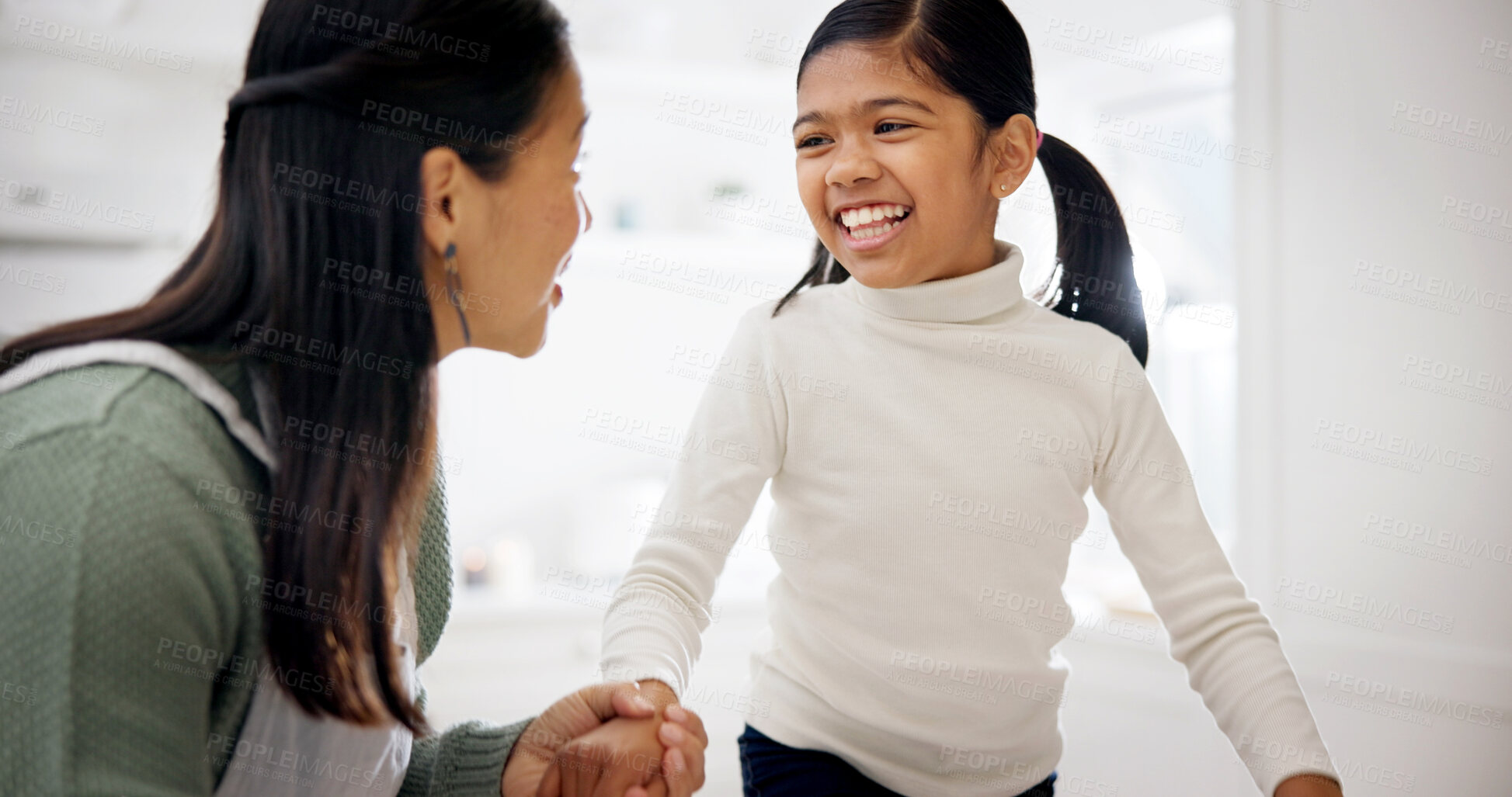 Buy stock photo Mom, bonding or holding hands with child in kitchen for playful weekend, holiday or baking together. Mother, kid or smile with daughter for fun childhood growth, learning or development in home