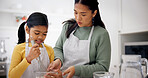 Baking, mother and girl with whisk in kitchen, teaching culinary skills and meal prep assistance. Learning, woman and kid with mixing bowl for cooking support, bonding and child development in home