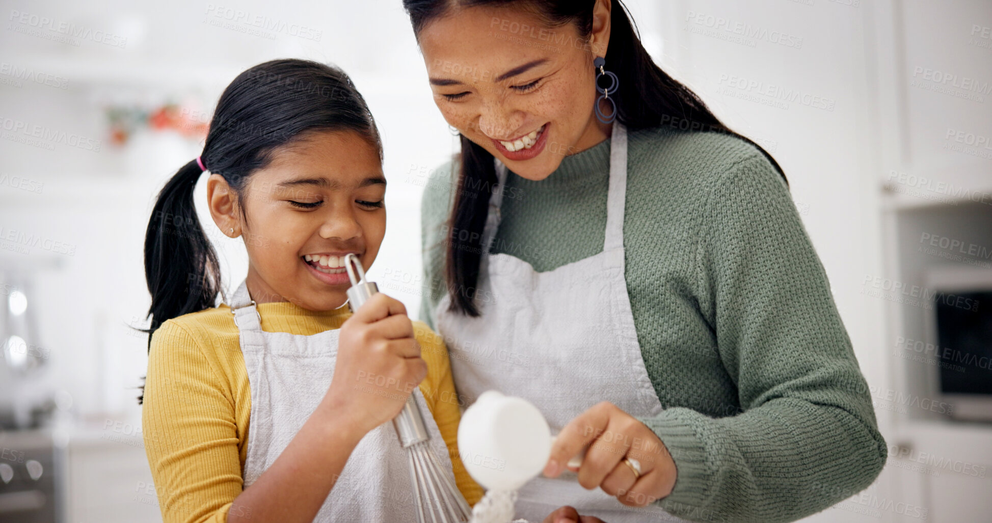Buy stock photo Baking, mother and daughter with whisk in kitchen, teaching culinary skills and meal prep assistance. Laughing, happy woman and child with ingredients for cooking support, bonding or learning in home