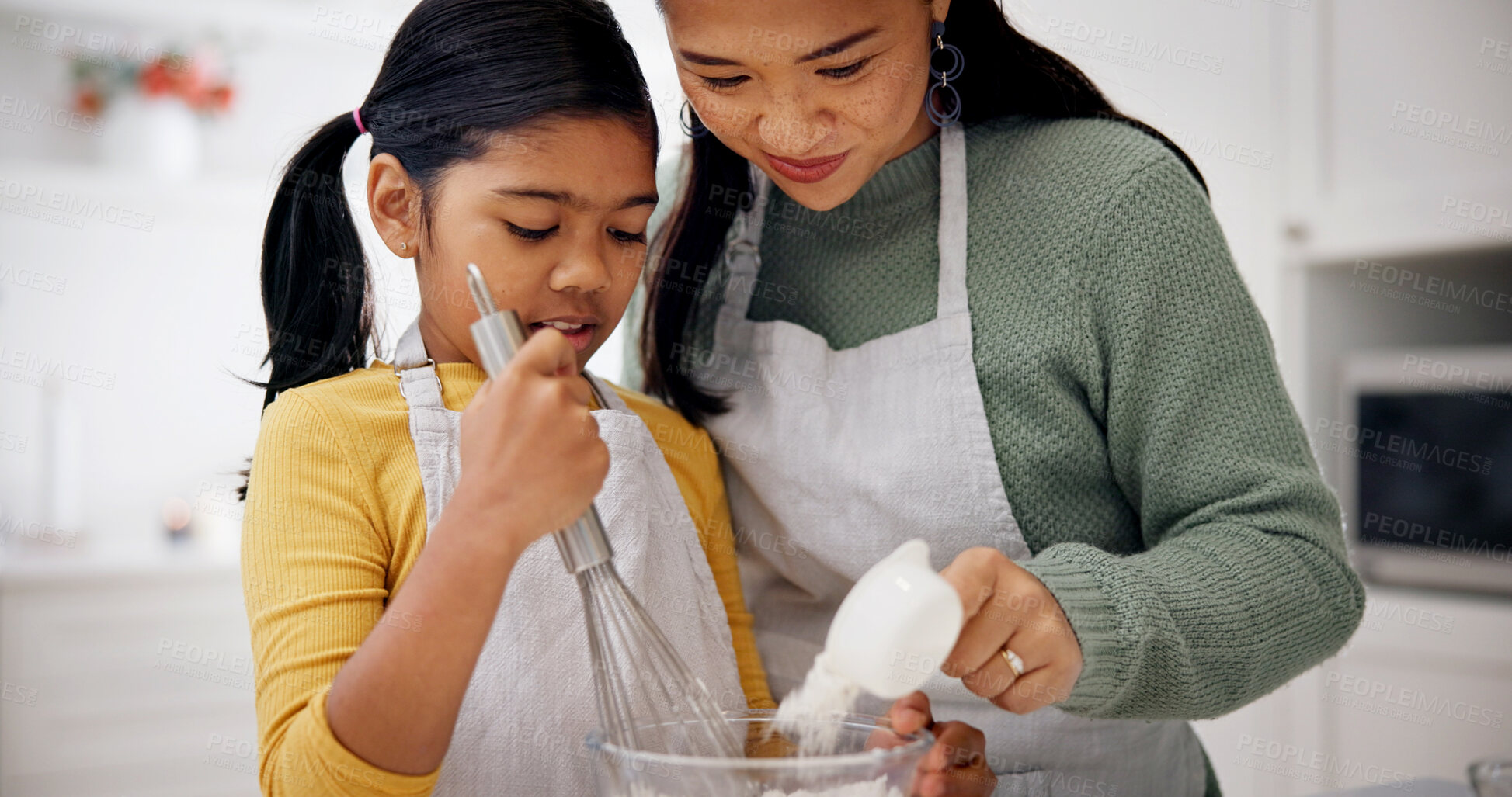 Buy stock photo Baking, mother and child with whisk in kitchen, teaching culinary skills and meal prep assistance. Learning, happy woman and girl with ingredients for cooking support, bonding and development in home