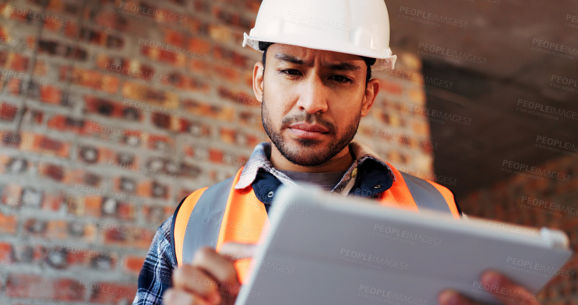 Buy stock photo Construction, confused and man on tablet for building report, site inspection and mistake. Architecture, low angle and person on digital tech with error for renovation project, remodeling and concern