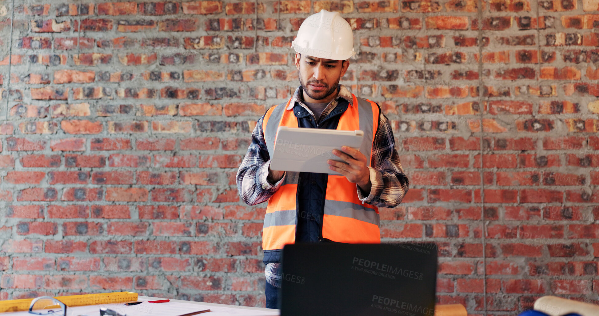 Buy stock photo Construction site, confused and man on tablet for building review, mistake and materials delay. Architecture, contractor and person on tech with error for renovation project, remodeling and concern