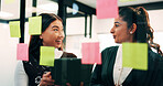 Women, planning and happy with tablet at glass wall, strategy or solution at finance agency. Business people, broker and team in office with tech, smile or insight on app at asset management company