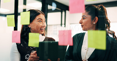 Buy stock photo Women, planning and happy with tablet at glass wall, strategy or solution at finance agency. Business people, broker and team in office with tech, smile or insight on app at asset management company