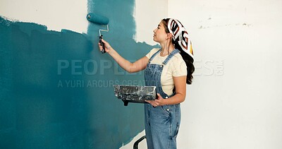 Buy stock photo Woman, roller and painting for renovation with wall, space and color for property development. Person, interior design, tools and equipment with application, smile and ladder for home improvement