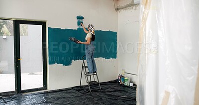 Buy stock photo Woman, ladder and painting for renovation with wall, creative and color for property development. Person, interior design, tools and equipment with stroke, maintenance and brush for home improvement