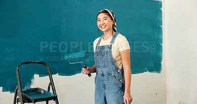 Buy stock photo Happy woman, portrait and painting wall for renovation, roller or color for property development. Girl, interior design and gear with brush, space or ladder for home improvement project in Indonesia